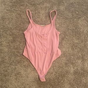 Pink body suit